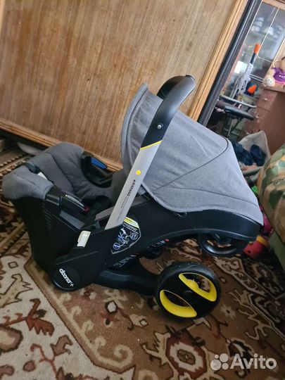 Коляска автокресло doona с базой isofix