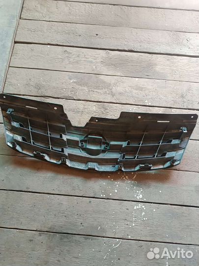 Решетка nissan almera
