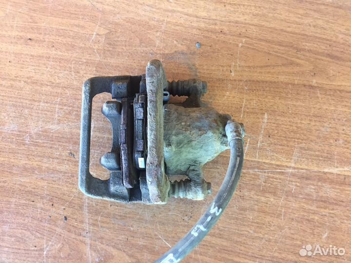 Суппорт задний левый Honda CR-V 2 RD5