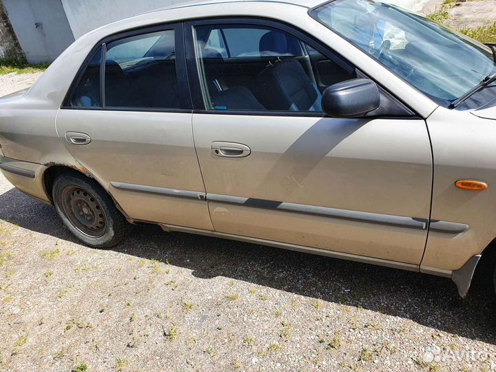 Мазда 626 2.0-1.8 1997 год по запчастям кому че