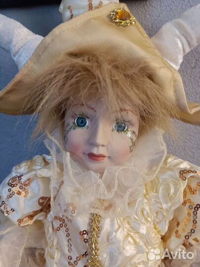 Кукла Арлекин музыкальная заводная