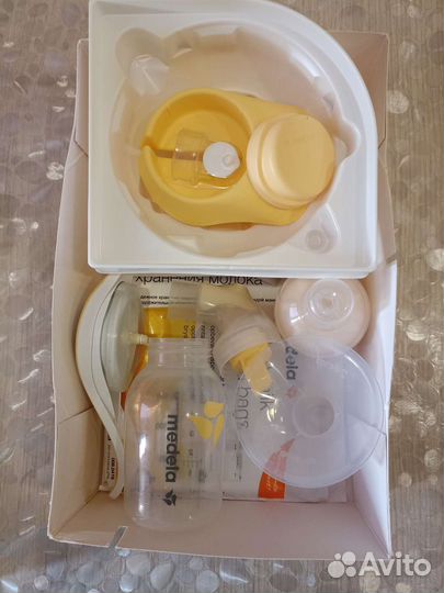 Молокоотсос medela электрический