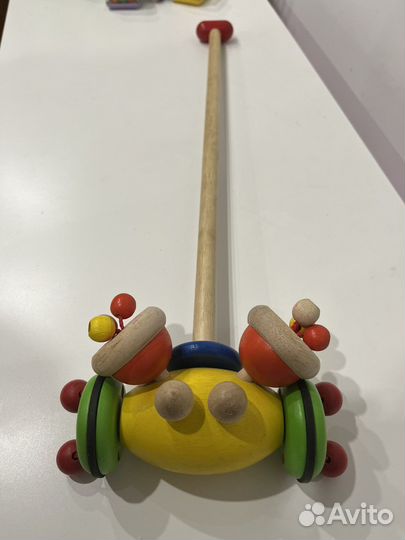 Деревянная игрушка каталка