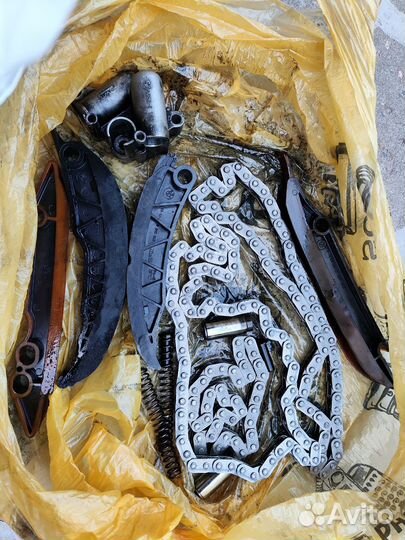 Натяжитель цепи грм