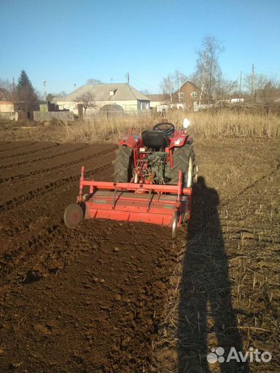 Вспашка земли минитрактором