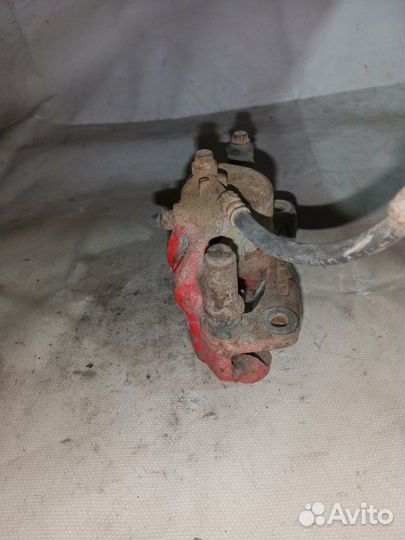 Суппорт тормозной передний левый Hyundai Accent