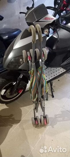 Коляска трость