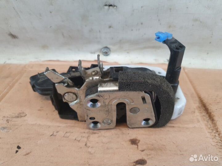 Замок двери передний левый Nissan Almera G15