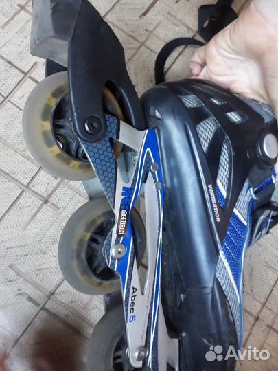 Роликовые коньки