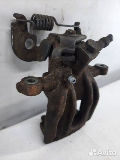 Суппорт тормозной задний левый Jaguar X-Type седан