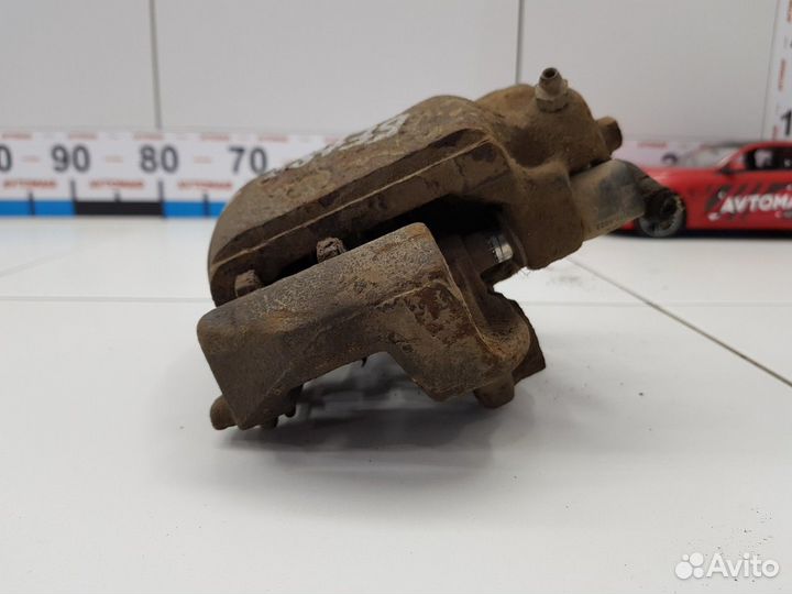 Суппорт передний левый (Daewoo Espero)