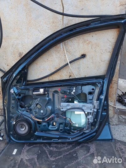 Дверь Nissan Almera N16