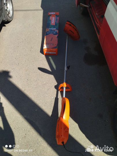 Электро газонокосилка