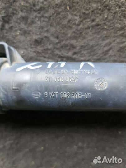 Форсунка омывателя фар левая Mercedes W211