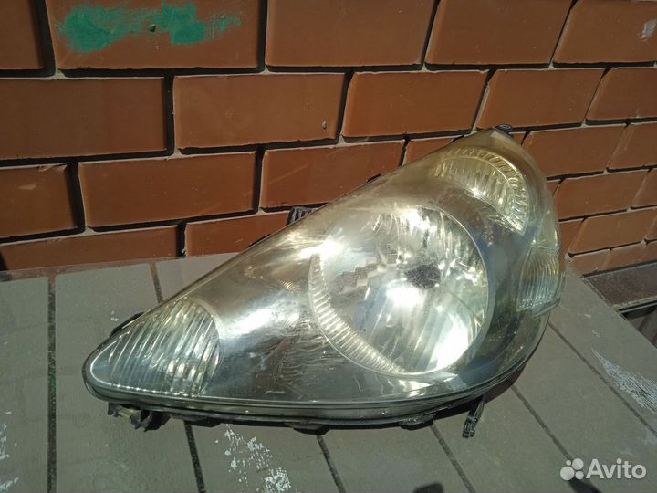 Фара honda fit 2003