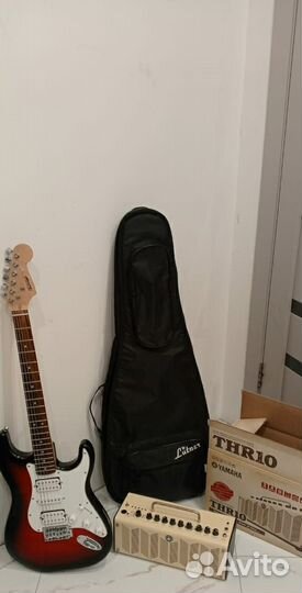 Электрогитара с гитарным усилителем