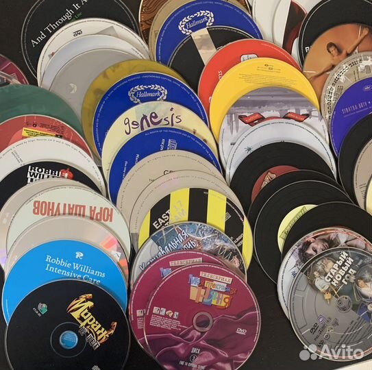 125 оригинальных CD и DVD