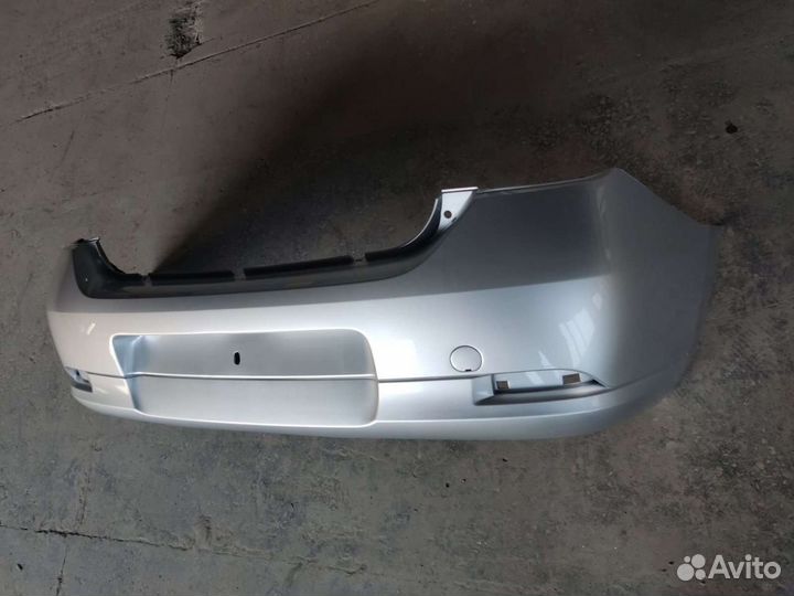 Бампер задний Рено Логан 14- г.в.новый,серебристый