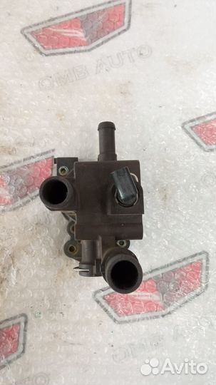 Корпус термостата Опель Astra H