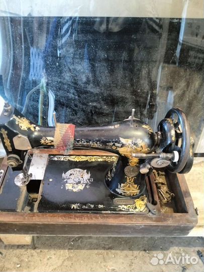 Швейная машина Singer