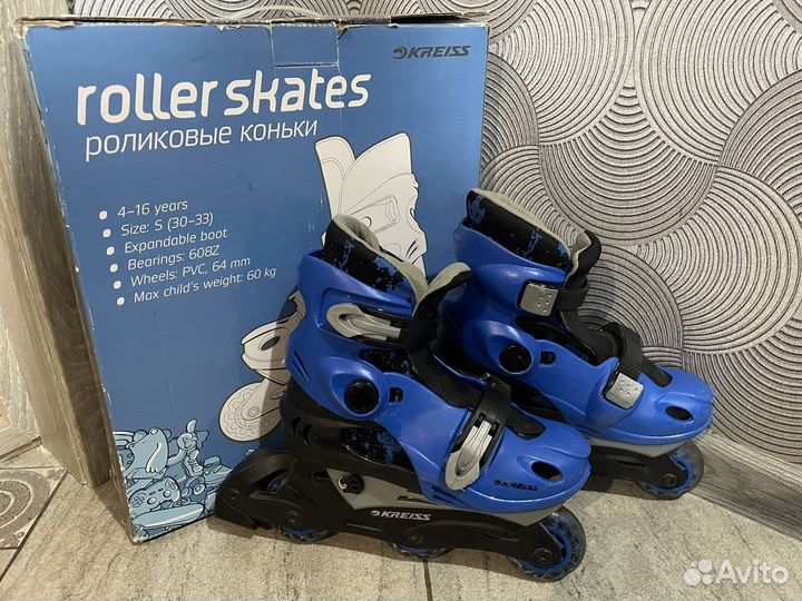 Роликовые коньки