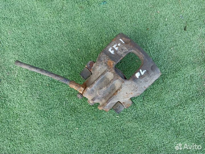 Тормозной суппорт передний левый Ford Focus 1