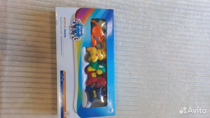 Музыкальный мобиль на кроватку