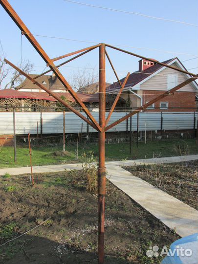 Вращающаяся сушилка для белья уличная