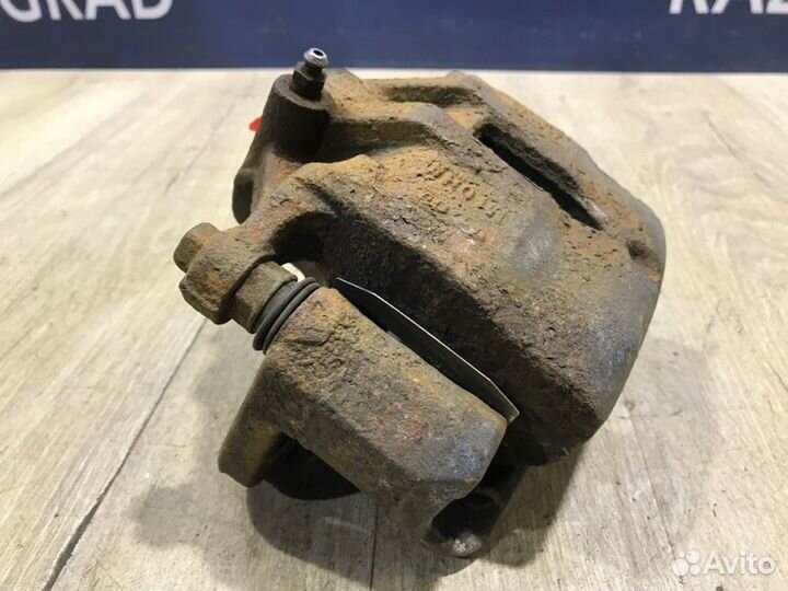 Суппорт передний правый Kia Sportage 3 2.0 G4KD