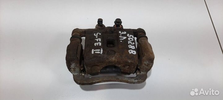 Суппорт задний левый (Hyundai Santa Fe II)