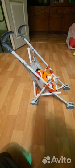 Детская игрушечная коляска