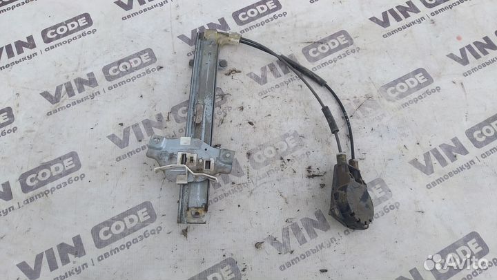 Стеклоподъемник задний мех правый Kia Shuma 1