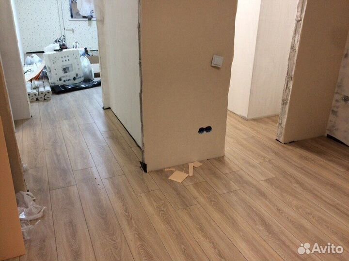 Укладка ламината и кварцвинила под ключ