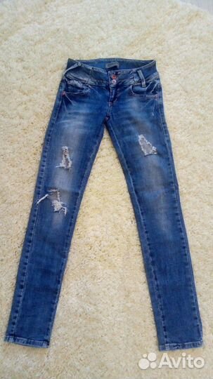 Джинсы рваные