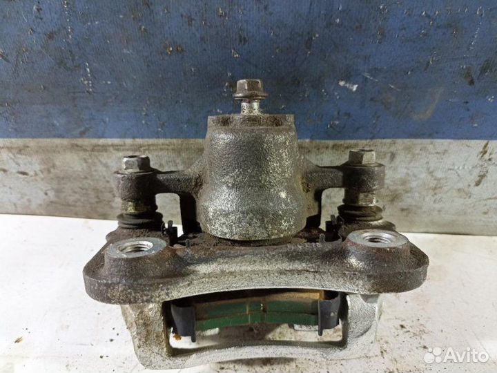 Суппорт тормозной задний левый Kia Optima JF