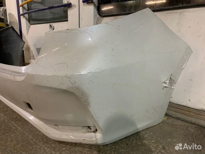 Бампер задний Toyota Corolla E210