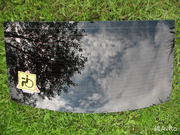Стекло заднее Renault Logan