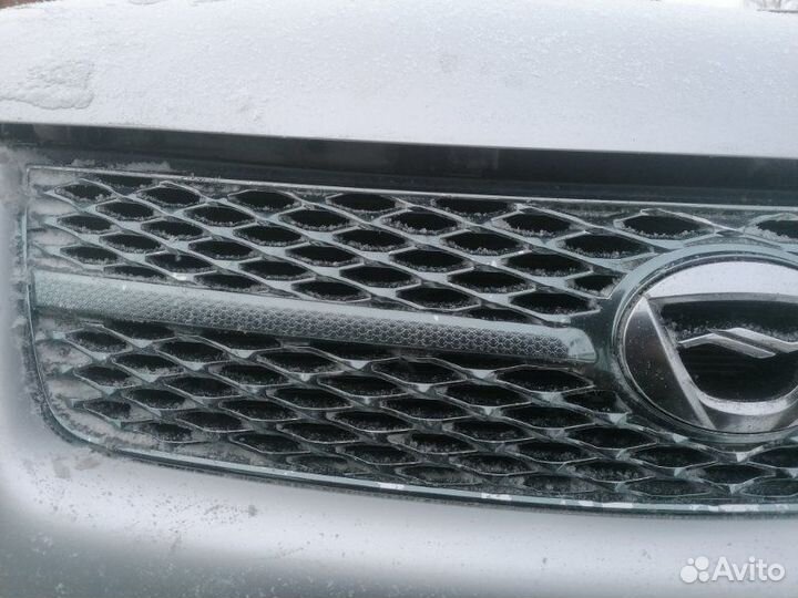 Решетка радиатора Toyota Corolla Fielder NZE144