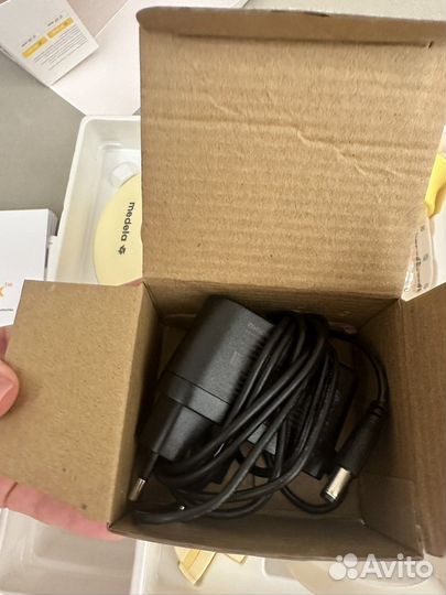 Молокоотсос medela электрический