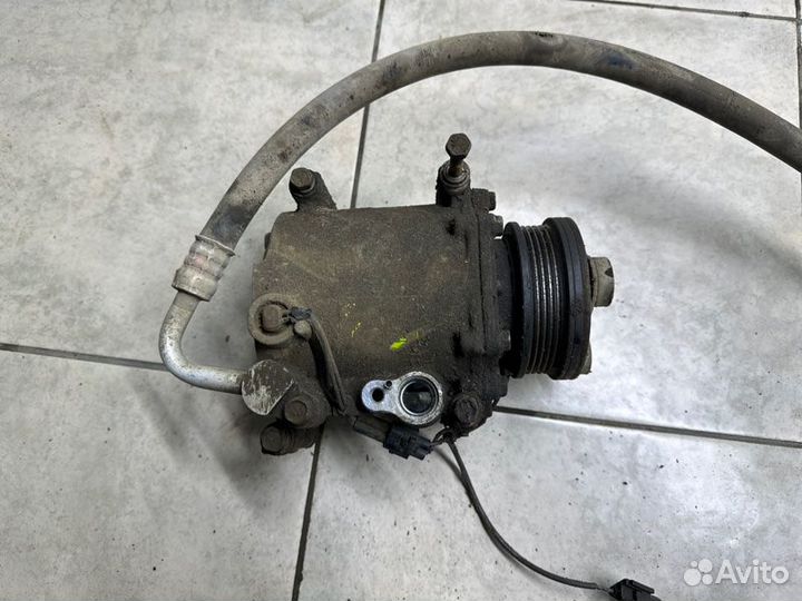 Компрессор кондиционера Mitsubishi Lancer 9