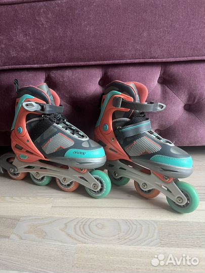 Роликовые коньки
