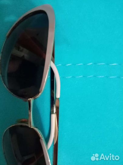 Солнцезащитные очки женские брендовые