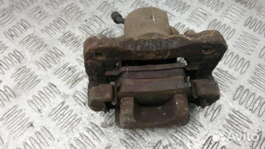 Суппорт тормозной задний левый toyota RAV 4 ZSA3