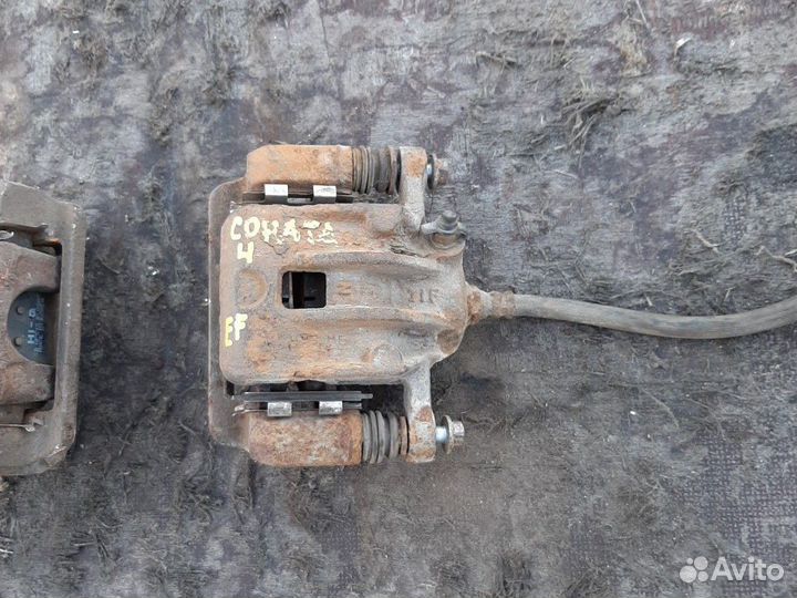 Супорт задний тормозной Хендай Соната 4 EF в сборе