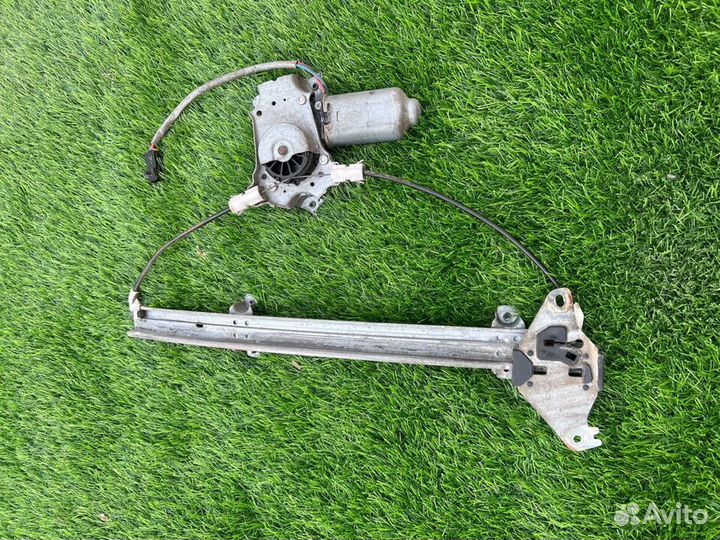 Стеклоподъемник передний левый primera p11