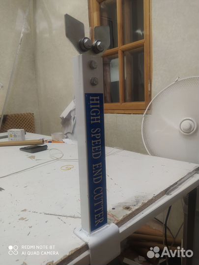 Размотчик для ткани для закройного стола