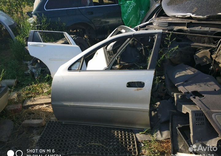 Дверь передняя левая Toyota Cresta gx90