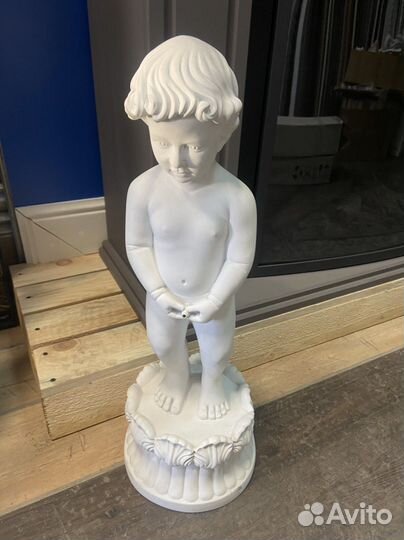 Статуя «Писающий мальчик» с функцией фонтана