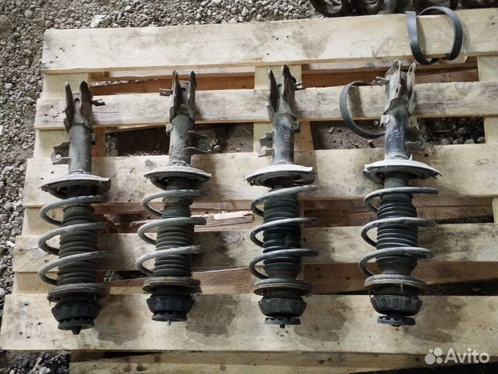 Стойка амортизатора передняя Solaris 1 RIO 3