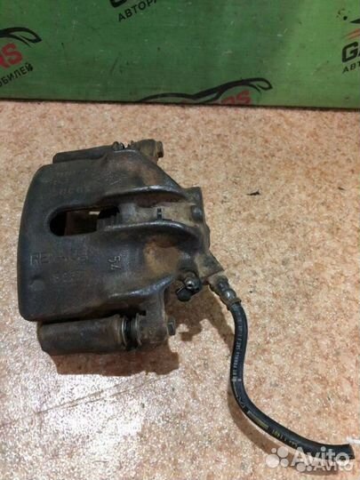 Суппорт тормозной передний левый Renault Scenic 1